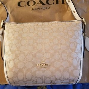 ISO matching wallet, wristlet and makeup bag in th